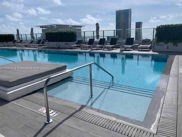 view of pool with a patio