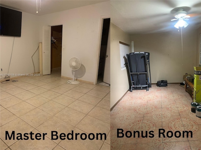 basement with ceiling fan and light tile patterned floors