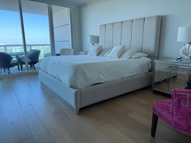 bedroom featuring wood-type flooring