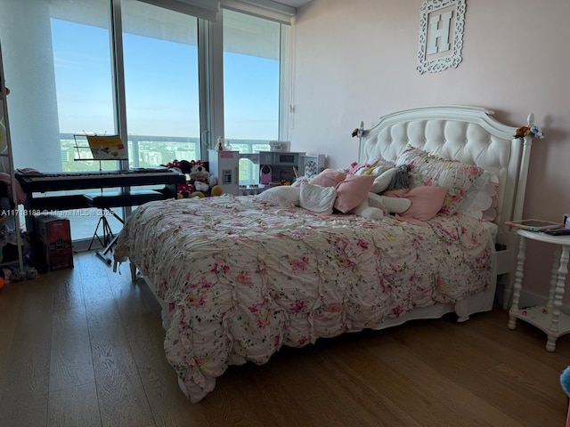 bedroom with wood-type flooring