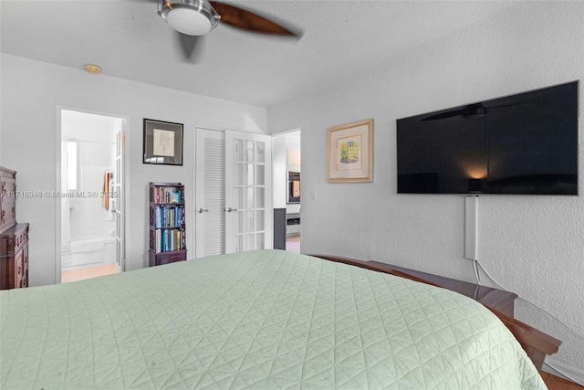 1000 SE 4th St Unit 312, Fort Lauderdale, FL 33301 - bedroom featuring ensuite bathroom, ceiling fan, and french doors