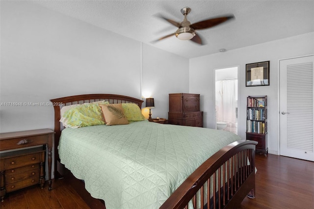 bedroom with connected bathroom, ceiling fan, dark hardwood / wood-style floors, a textured ceiling, and a closet