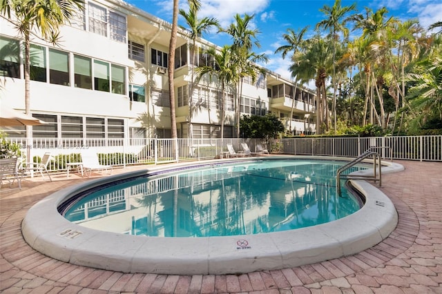 view of pool featuring a patio