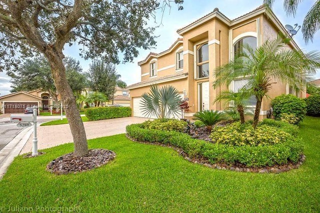 view of front of property with a front lawn