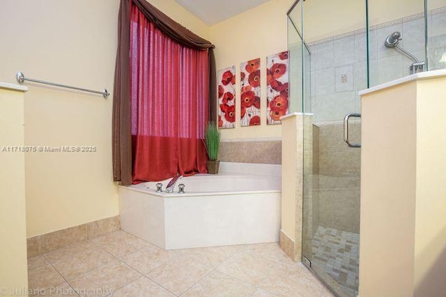 bathroom with tile patterned floors and plus walk in shower