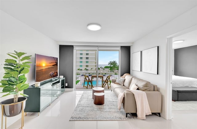 tiled living room with expansive windows