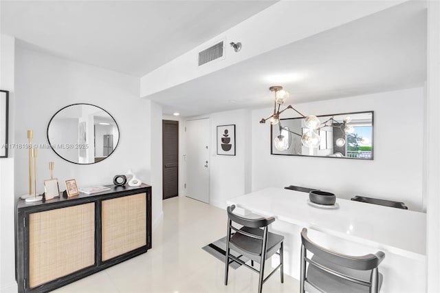 dining area with a notable chandelier