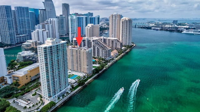 birds eye view of property featuring a water view