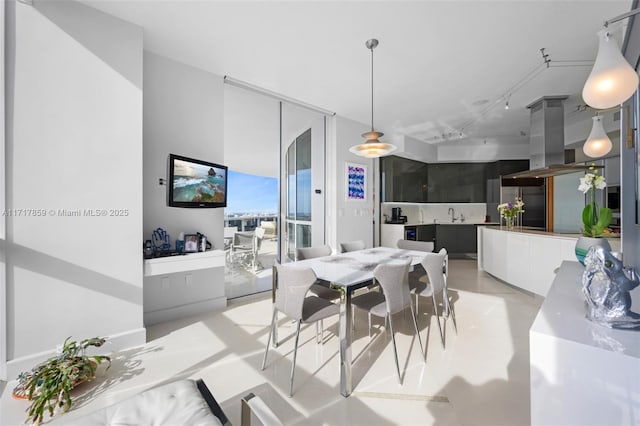 dining area featuring sink