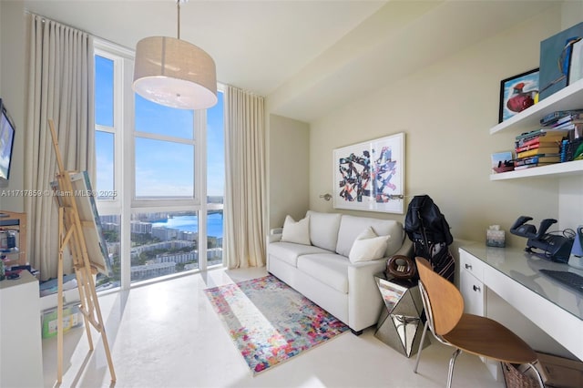 living room with floor to ceiling windows