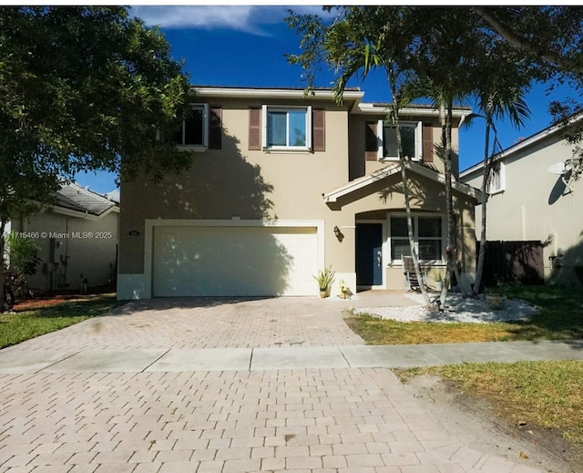 view of front of home with a garage