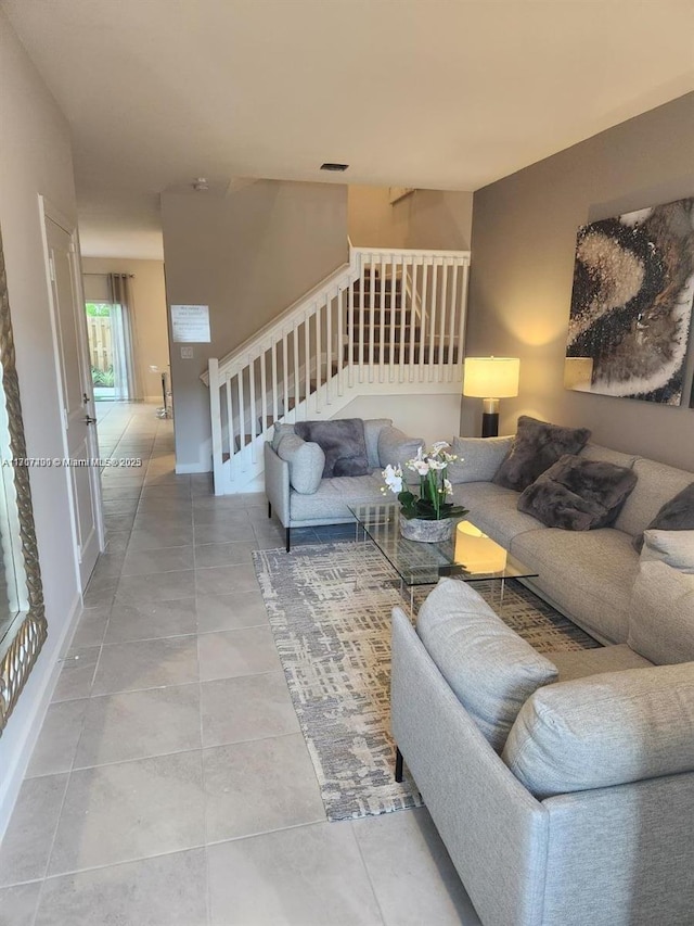 living room featuring tile patterned floors