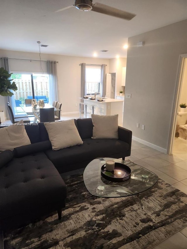 living room with light tile patterned floors