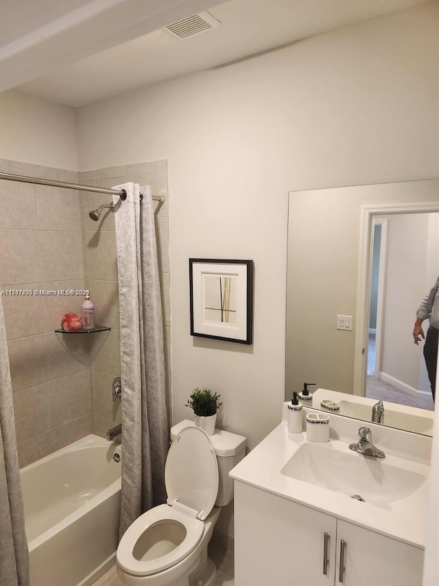 full bathroom with shower / bath combination with curtain, vanity, and toilet