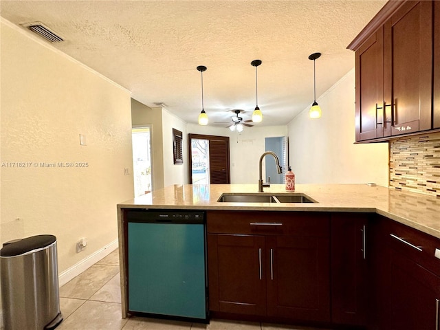 kitchen featuring sink, stainless steel dishwasher, ceiling fan, light tile patterned flooring, and kitchen peninsula