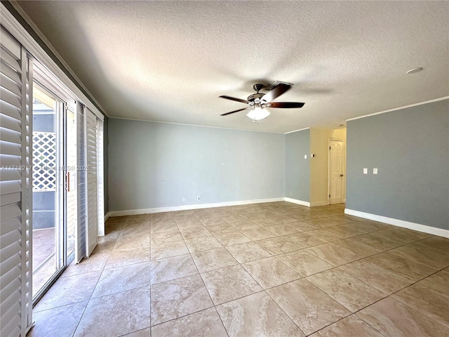 unfurnished room featuring ceiling fan, light tile patterned floors, and a textured ceiling