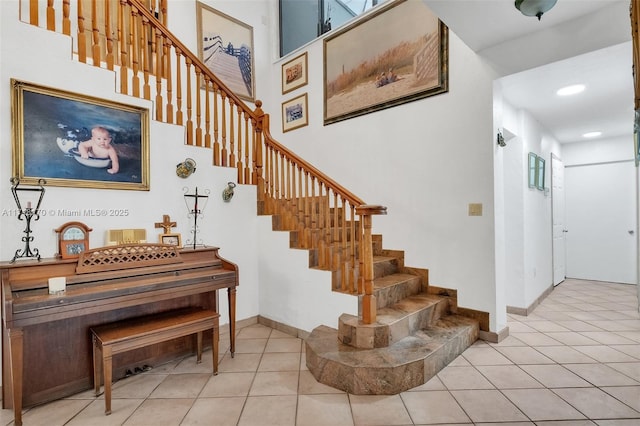 entrance foyer with light tile patterned floors