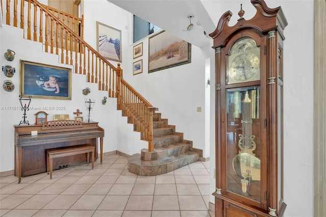 tiled dining space with a notable chandelier