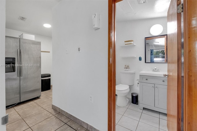 bedroom with lofted ceiling, cooling unit, and light tile patterned floors