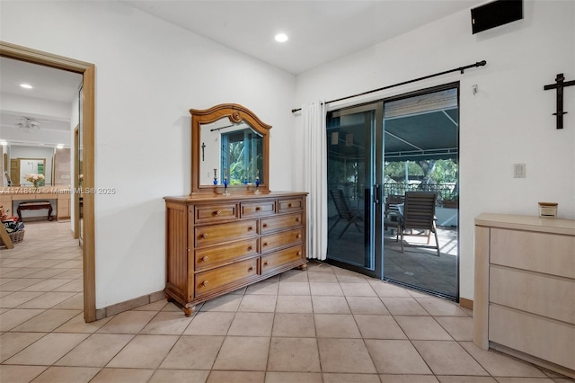 bedroom featuring ceiling fan and light tile patterned floors