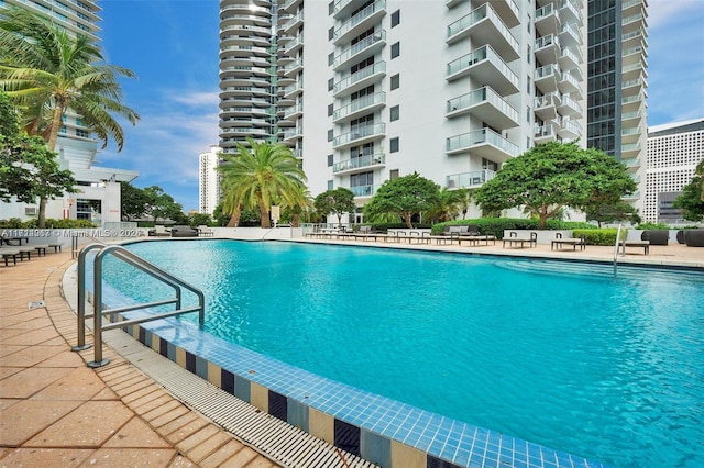 view of swimming pool featuring a patio