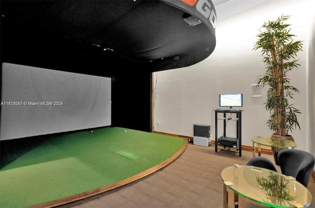 recreation room with golf simulator