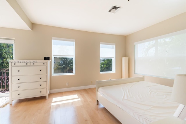 bedroom featuring light hardwood / wood-style floors