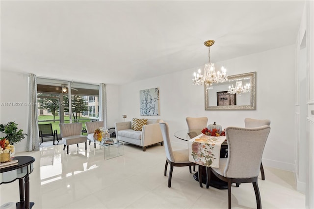 dining area featuring a notable chandelier and floor to ceiling windows