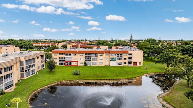 drone / aerial view with a water view