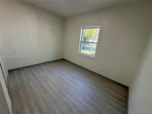 empty room with light hardwood / wood-style floors