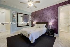 bedroom with wallpapered walls, an accent wall, baseboards, and ornamental molding