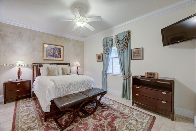 bedroom with a ceiling fan, crown molding, and baseboards