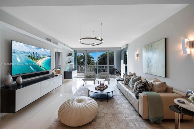 cinema room with an inviting chandelier