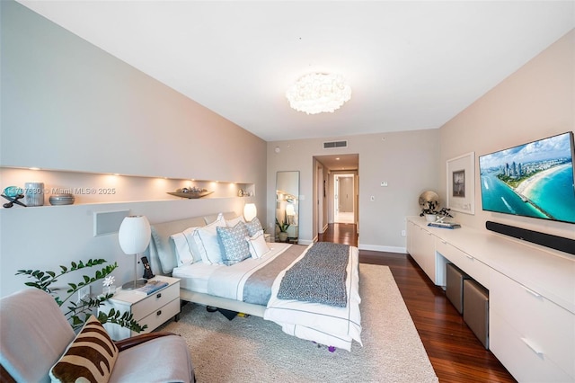 bedroom featuring dark wood-type flooring