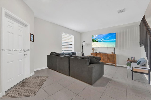 living room with light tile patterned floors