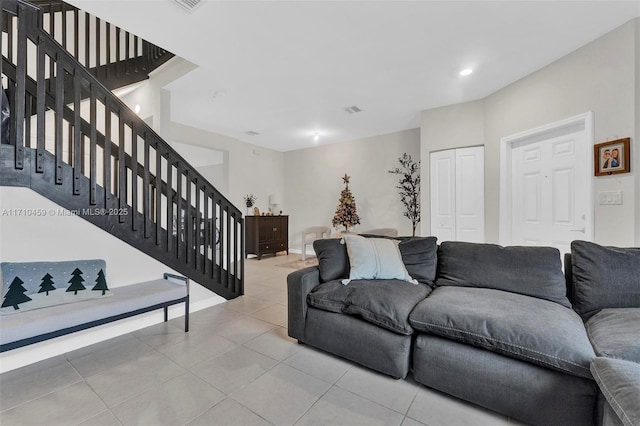 living room featuring light tile patterned floors