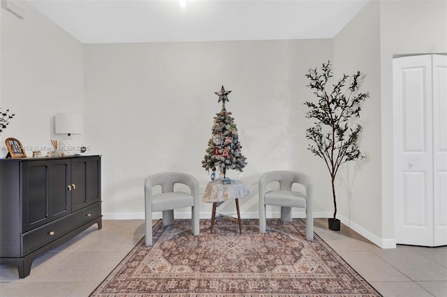 living area featuring light tile patterned floors