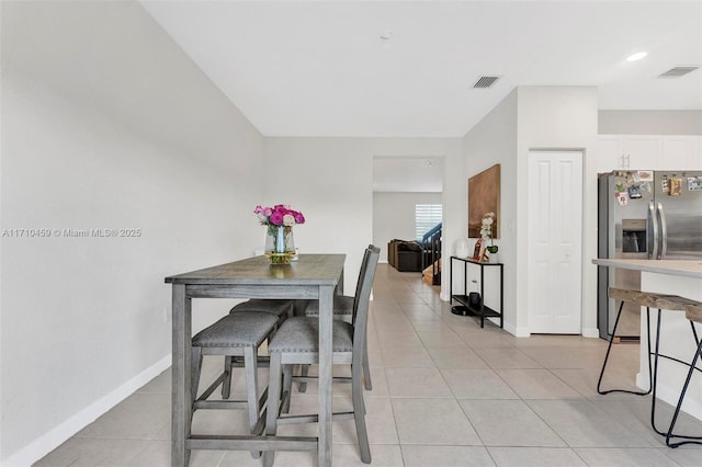 dining room with light tile patterned floors