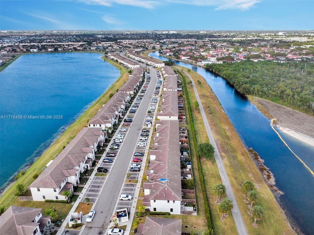 drone / aerial view with a water view