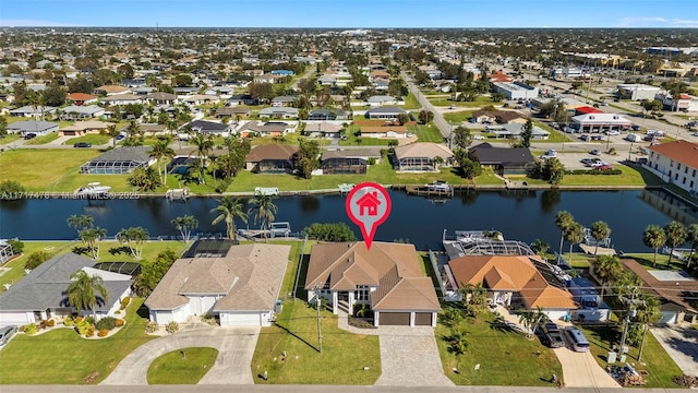 drone / aerial view with a water view