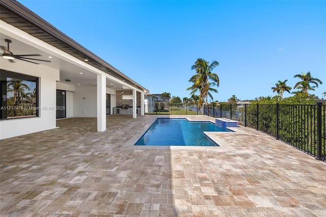 view of pool with ceiling fan and a patio