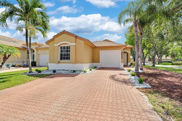 view of front of house with a garage