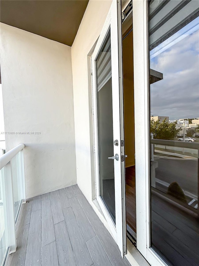 balcony featuring french doors