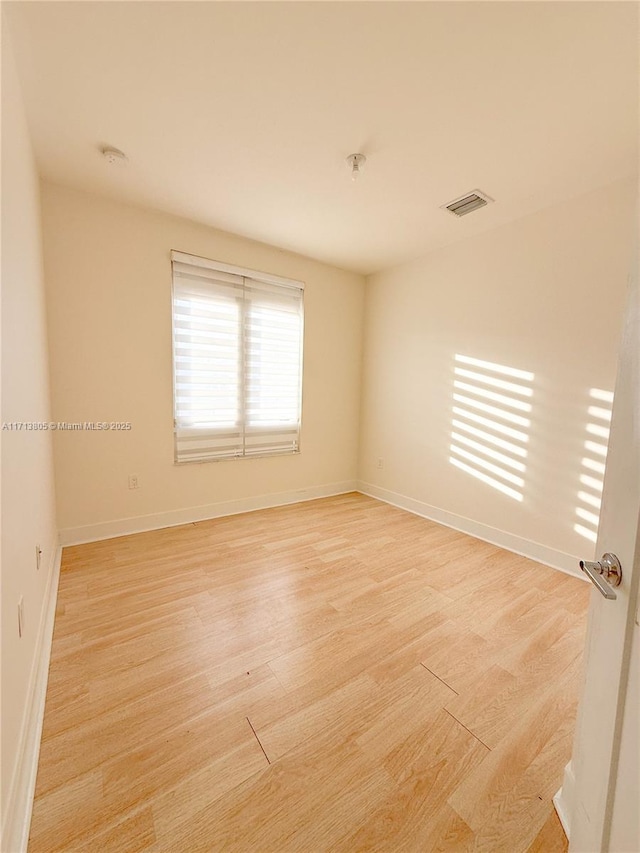 empty room featuring light wood-type flooring