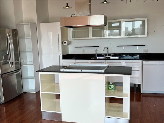 kitchen featuring sink, stainless steel fridge, white dishwasher, island exhaust hood, and white cabinets