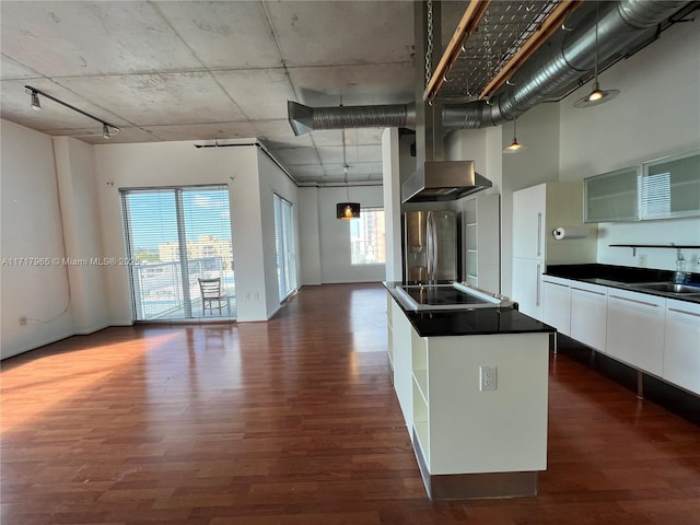 kitchen with white cabinetry, black electric cooktop, dark wood-type flooring, and stainless steel refrigerator with ice dispenser