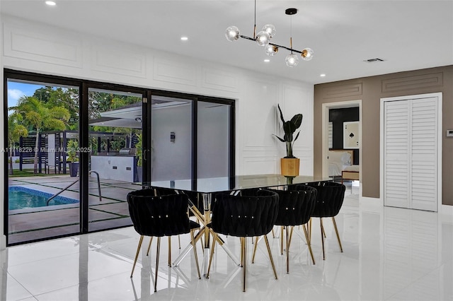 dining area with a chandelier