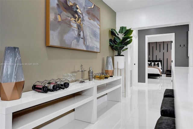 hallway with light tile patterned floors