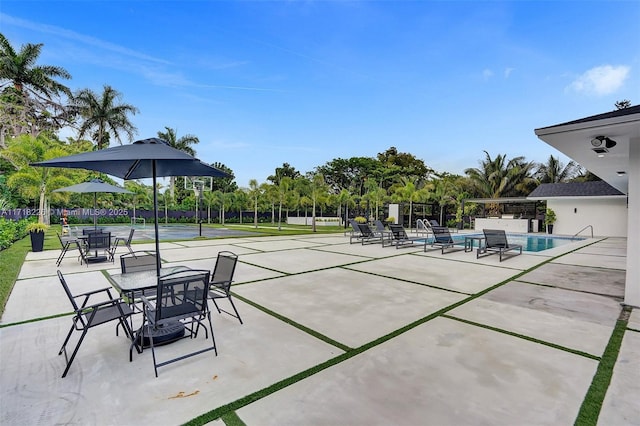 view of patio with a community pool