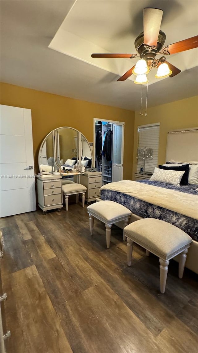 bedroom featuring ceiling fan and dark hardwood / wood-style flooring